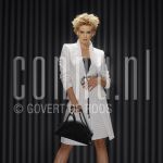 24-01-2004 Daphne Deckers dressed by Mart Visser at studio in Amsterdam, by order of Beaumonde. January 24, 2004.




[keywords]Posed, Skirt, Blazer[/keywords]